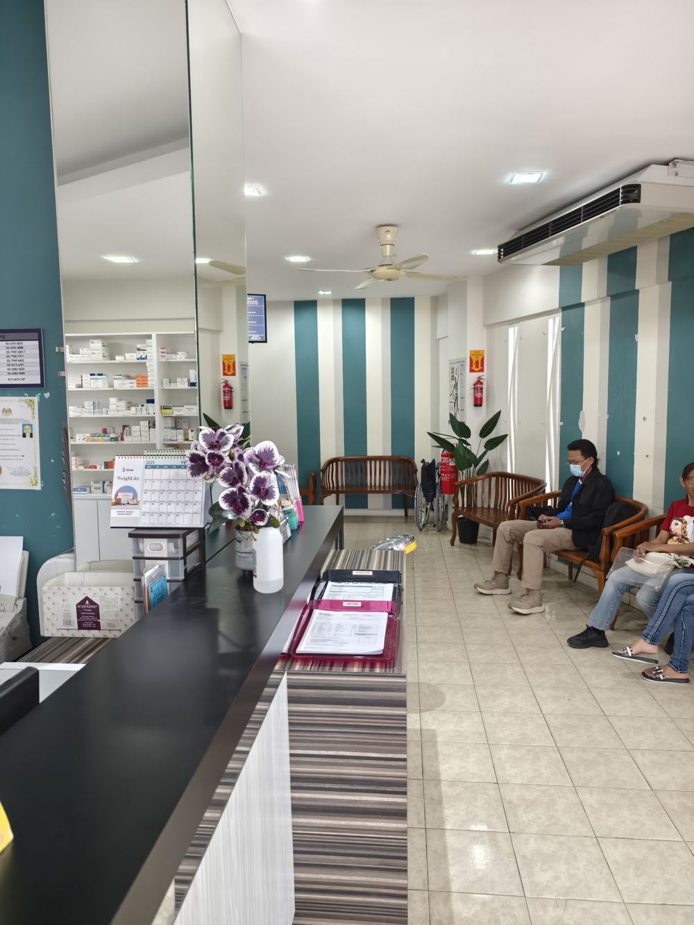 Waiting area with teal stripes